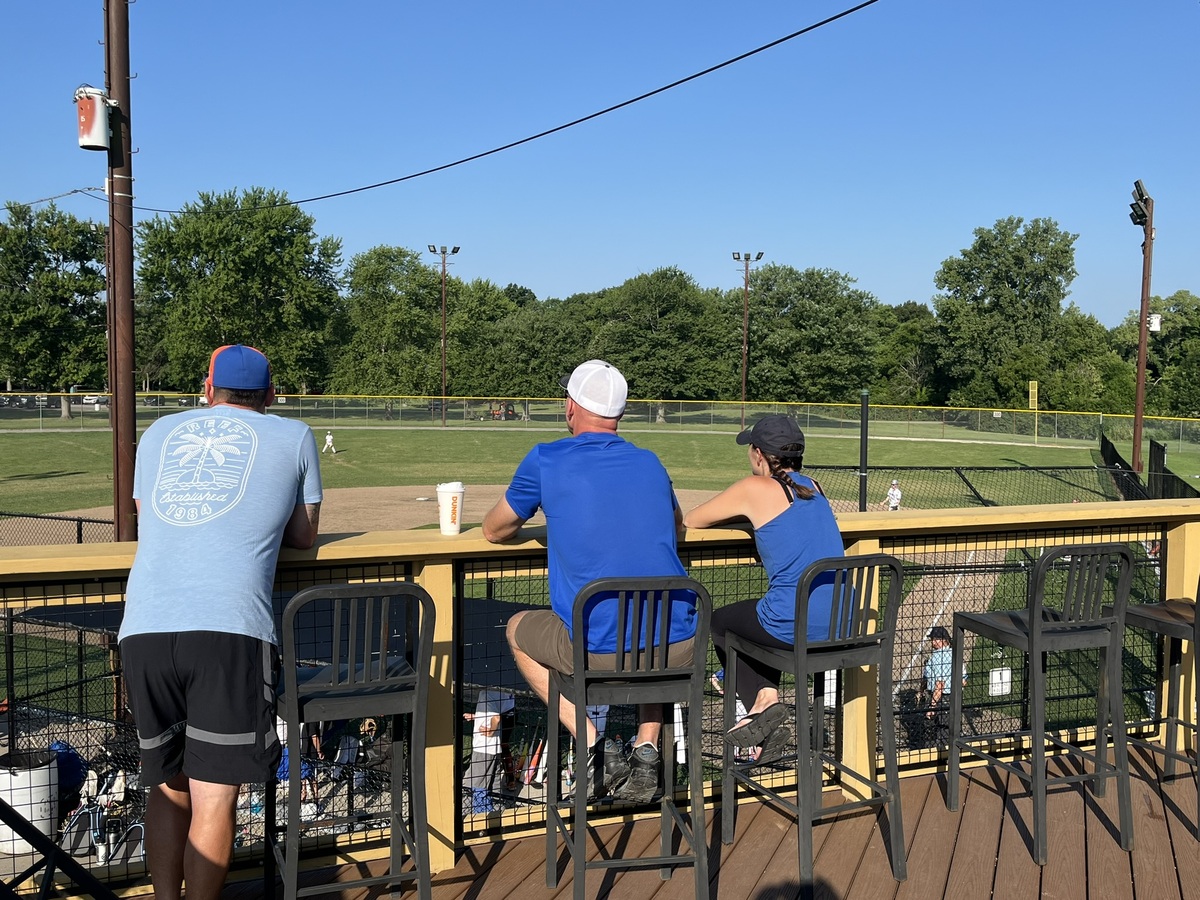 People enjoying a softball game